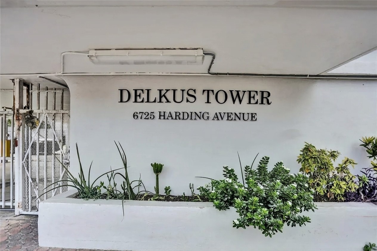 The building's own address sign at Delkus Towers, 6725 Harding Avenue, Miami Beach